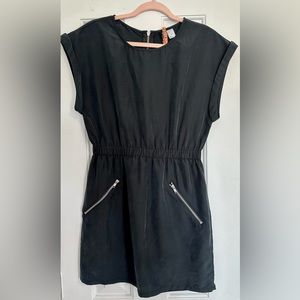 Black mini dress  with zipper pockets and back by H&M size 6